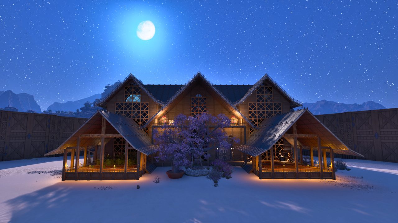 Snow-covered lodge at night